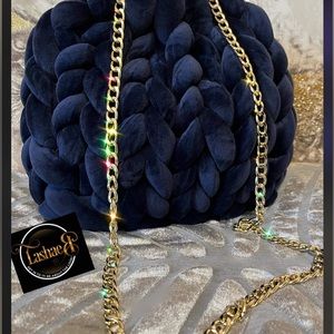 Tubular midnight crochet purse, you can wear for a fine dining girls outing.